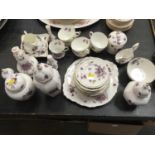 Collection of Hammersley Victorian Violets pattern teaware, vases and other items.
