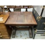 1930's oak draw leaf dining table on bulbous cup and cover supports, 93cm x 91cm closed, 153cm exten