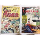 Two vintage comic books to include Al Capp's Li'l Abner, No. 74, January 1950 and Superman's Girlfri