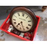 A Reid & Sons Newcastle on Tyne cased wall clock, with an alarm clock and a camera