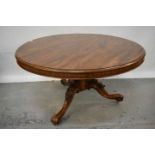 Victorian mahogany circular dining table and set of six dining chairs