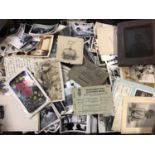 Two boxes of old photographs, postcards, albums and books