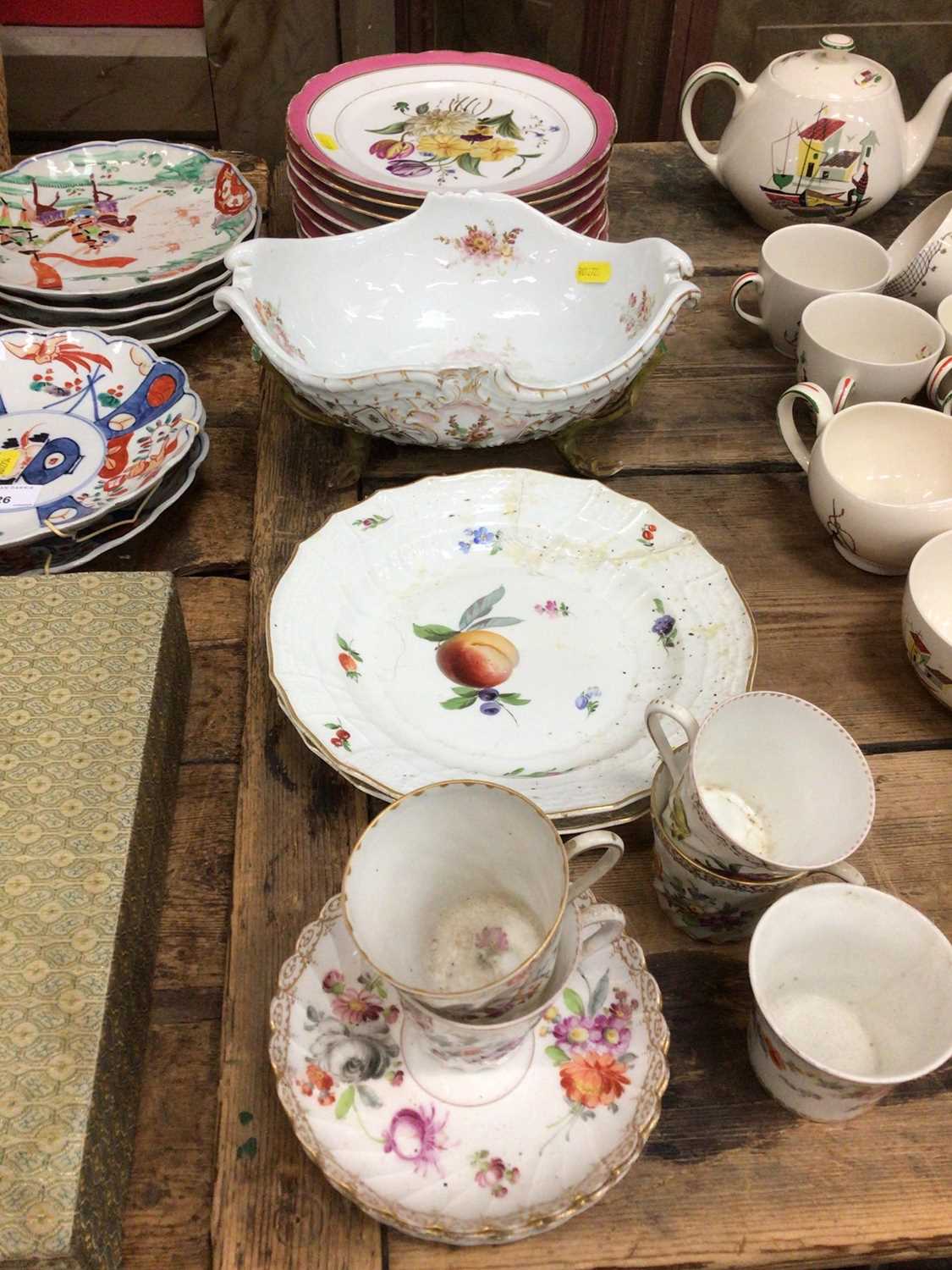 A Meissen bowl with scalloped rim, moulded basket form, with four root and branch legs, together wit