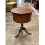 Burr walnut veneered occasional table with pie crust top and door below on turned and carved column