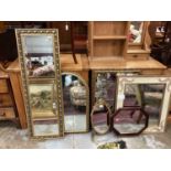 Six various wall mirrors including one bevelled and one etched