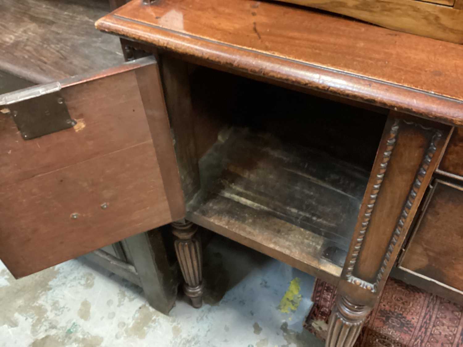 Late Regency mahogany inverted breakfront sideboard with an arrangement of drawers and cupboards on - Image 3 of 4