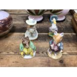 Four Beatrix Potter figures, including two Beswick and two Royal Doulton