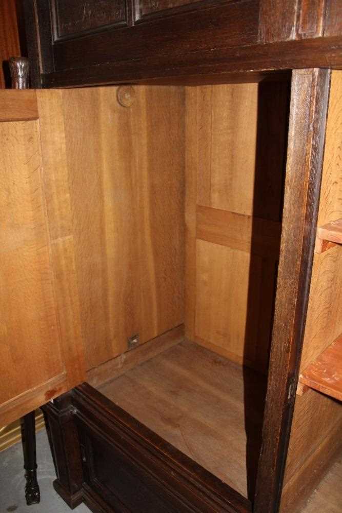 Late 19th / early 20th century Continental carved oak cupboard, enclosed by two pairs of panelled do - Image 6 of 9