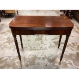 19th century mahogany tea table with foldover top on receded turned legs, 91cm wide, 44cm deep, 75cm