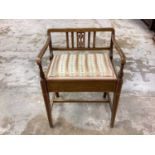 Edwardian inlaid mahogany piano stool with padded rising seat on square taper legs joined by stretch