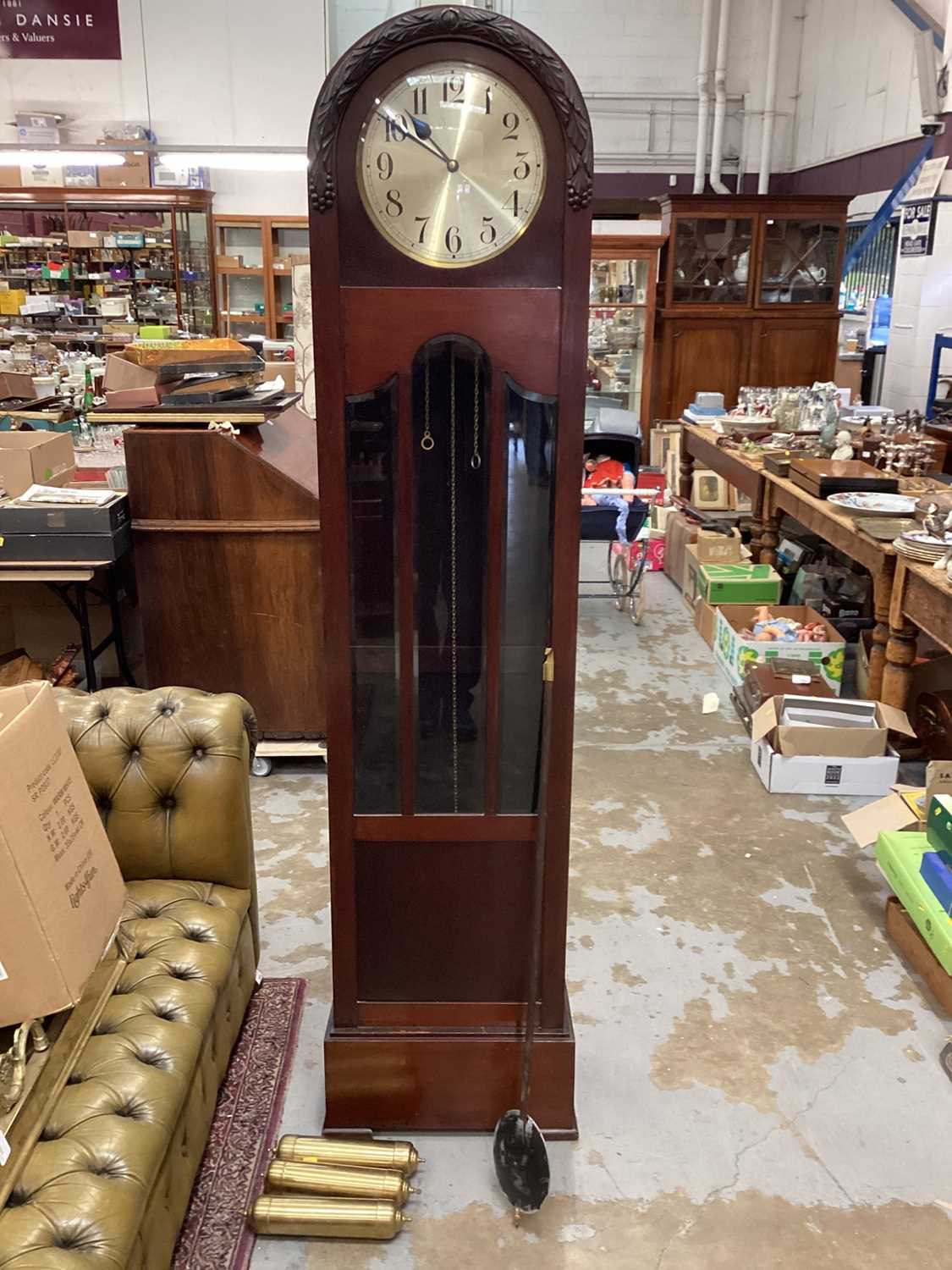 Early 20th century mahogany longcase clock with pendulum and three brass weights