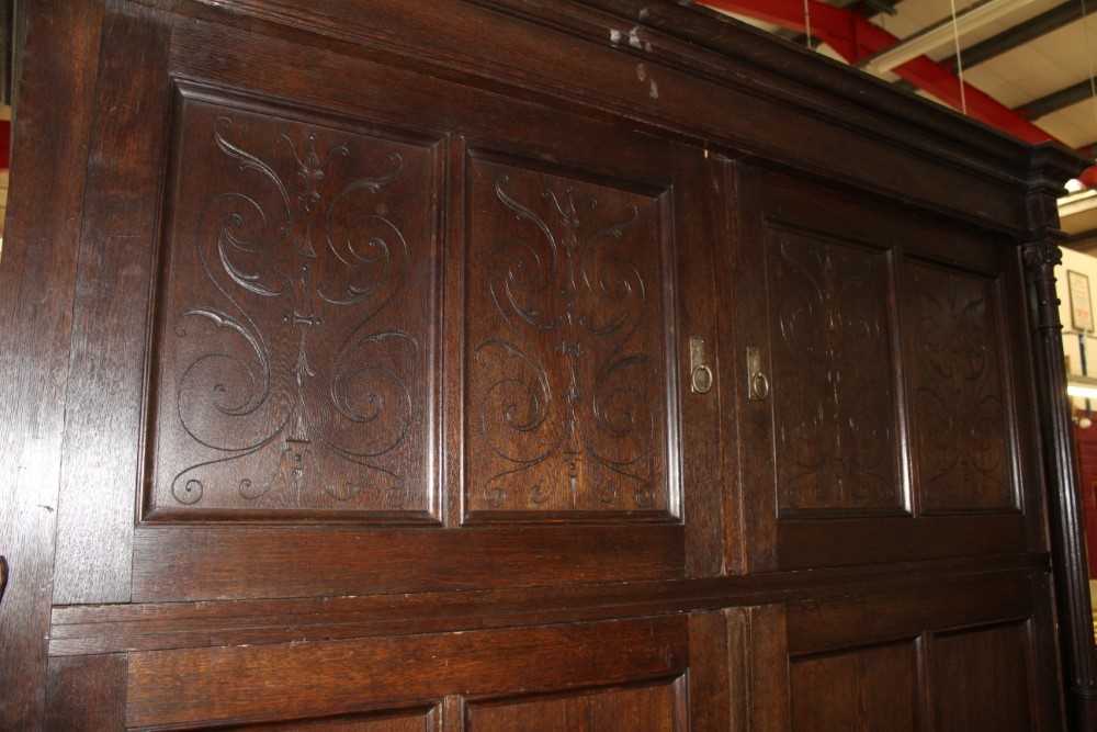 Late 19th / early 20th century Continental carved oak cupboard, enclosed by two pairs of panelled do - Image 2 of 9