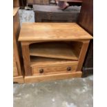 Contemporary pine low side cupboard with single shelf above drawer