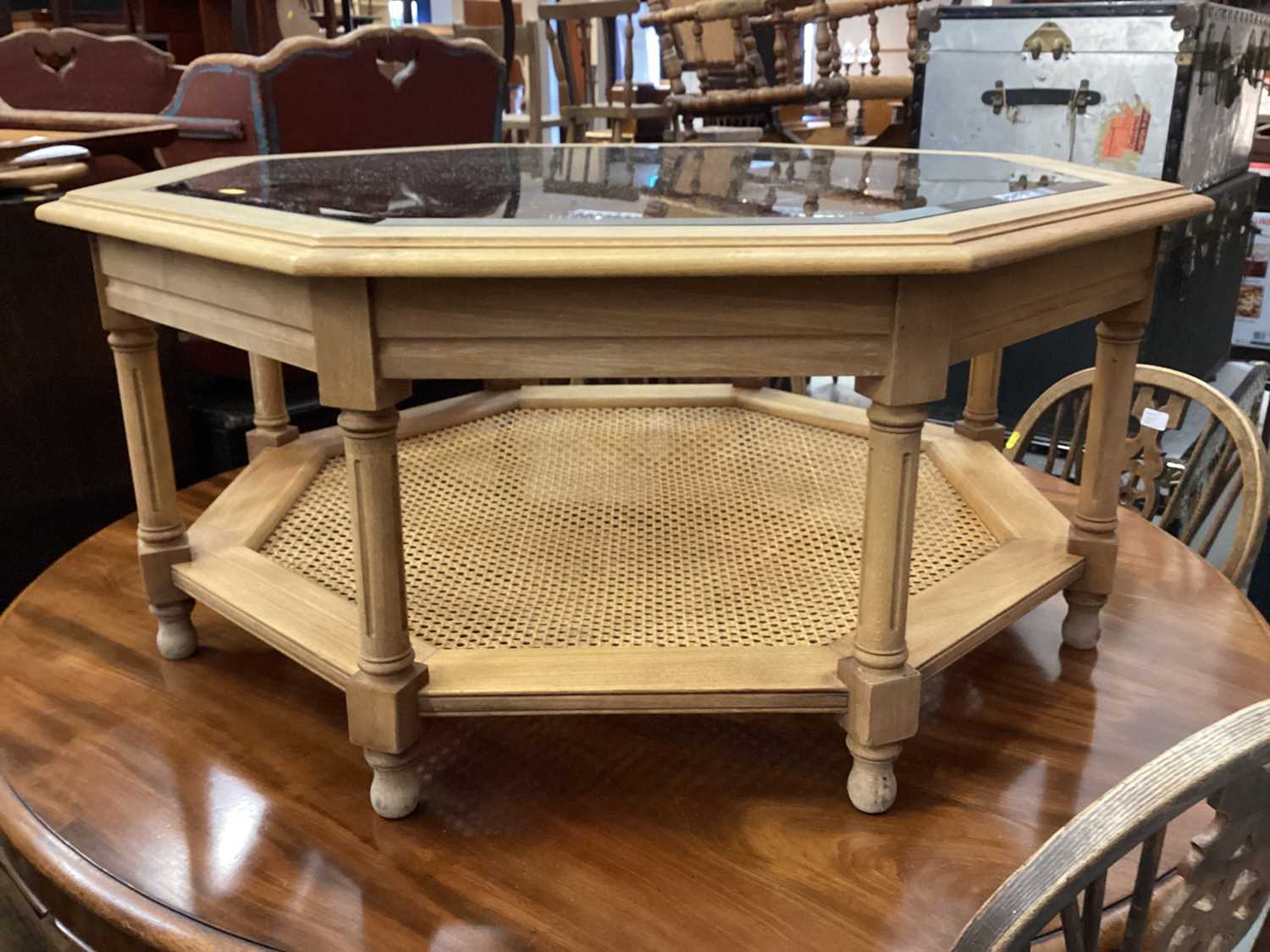Octagonal coffee table with glass top on turned and block legs with caned undertier, 97cm wide, 43cm - Image 2 of 2