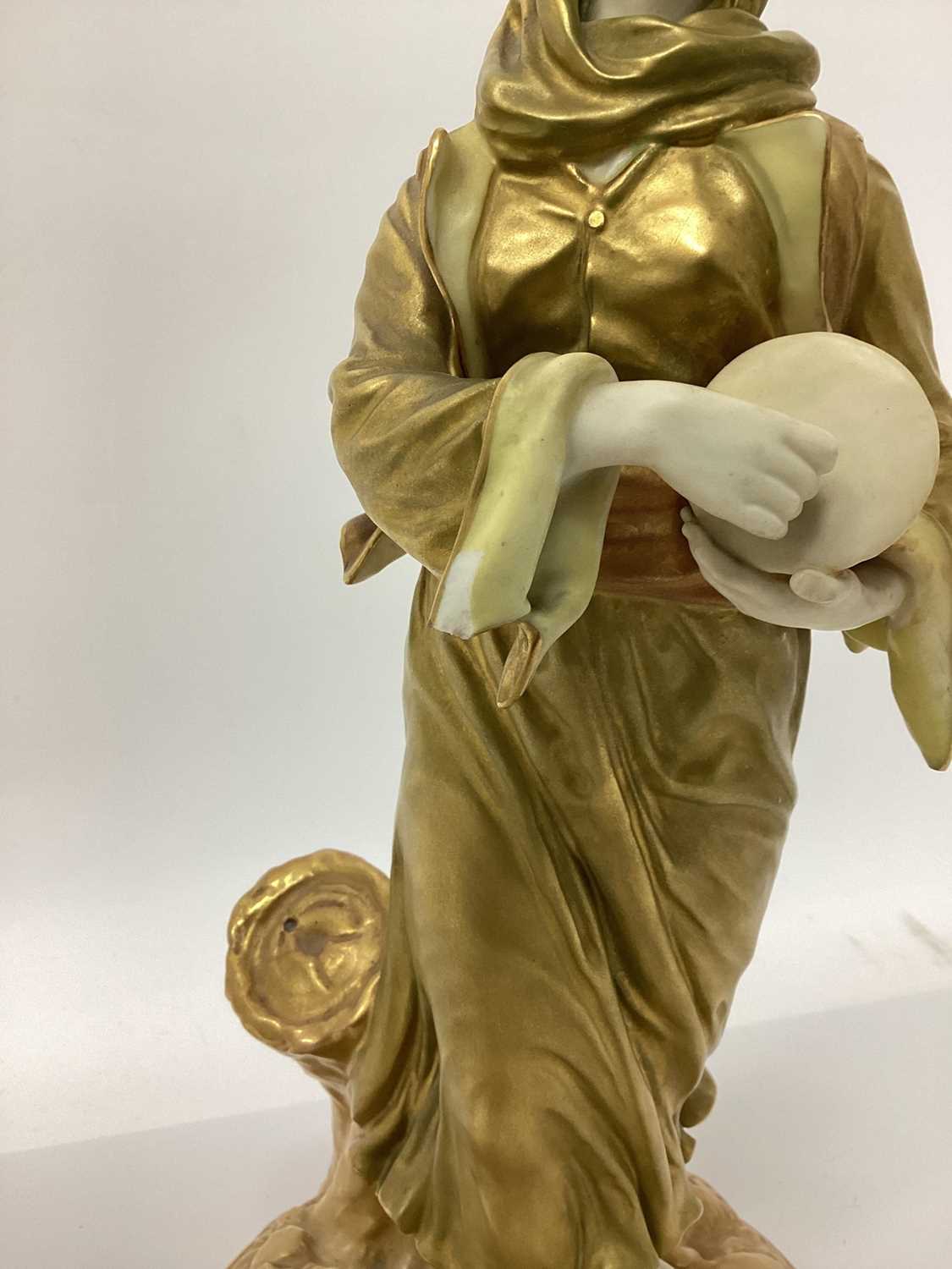 An early 20th century Royal Worcester figure of a musician, modelled in gilt as a lady with a drum, - Image 4 of 7