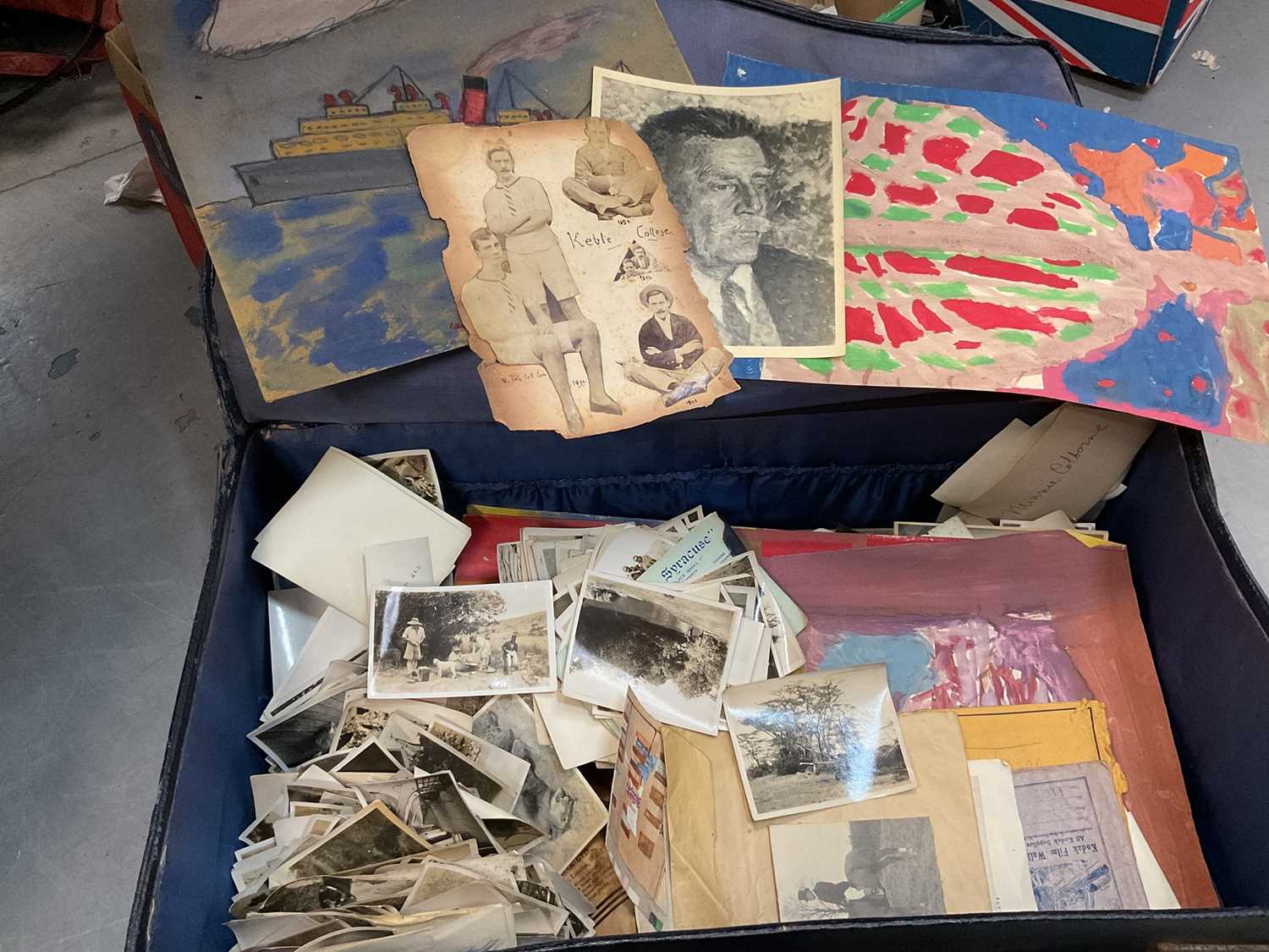 Suitcase of mixed ephemera to include photographs and other items.