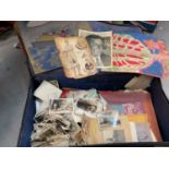 Suitcase of mixed ephemera to include photographs and other items.