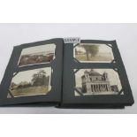 Postcards in album including real photographic street scenes,horses and carts, military...