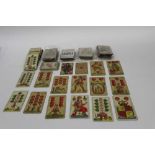 Four part sets of 19th century playing cards by Bancks Brothers and sealed set of French poker cards