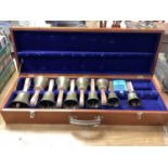 Set of ten handbells in fitted case