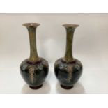 Pair of Royal Doulton stoneware vases and three others