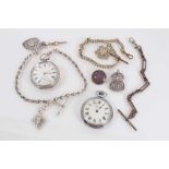 Late Victorian silver pocket watch on silver watch chain with two silver fobs
