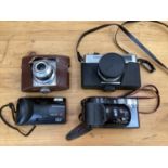 Collection of mixed cameras, together with two cased binoculars.