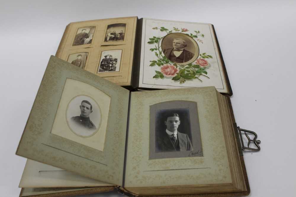 Early Photography - Two leather albums, one with illustrated pages, containing Victorian Cabinet car