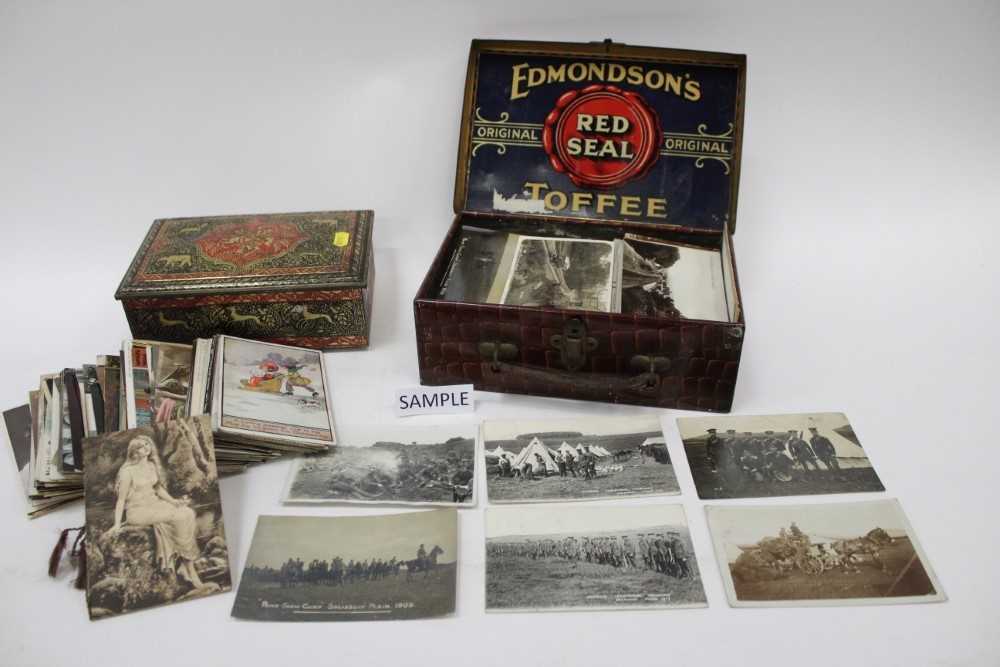 Postcard accumulation in tins and album including Collection of real photographic First World War er