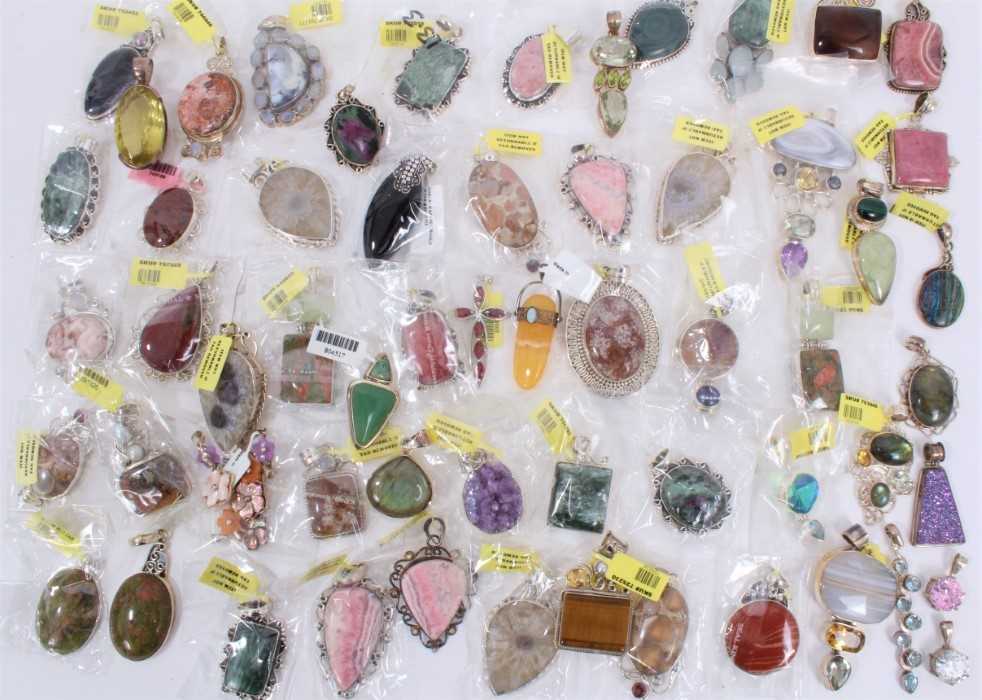 Collection of silver mounted semi precious stone pendants