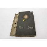 Postcard album of Judges Real Photographic cards, London at night, busy street scenes, policeman, li