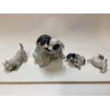 Four Royal Copenhagen porcelain models of Dogs, number 260, 058, 3476 and 3080