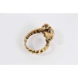 Yellow metal ram's head ring wit wrap around textured shank