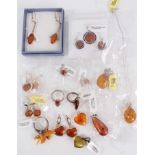 Group of silver and white metal mounted amber jewellery