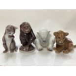Four Bing & Grondahl porcelain models - Monkey number 1055, Polar Bear 2536 and Kitten 2516
