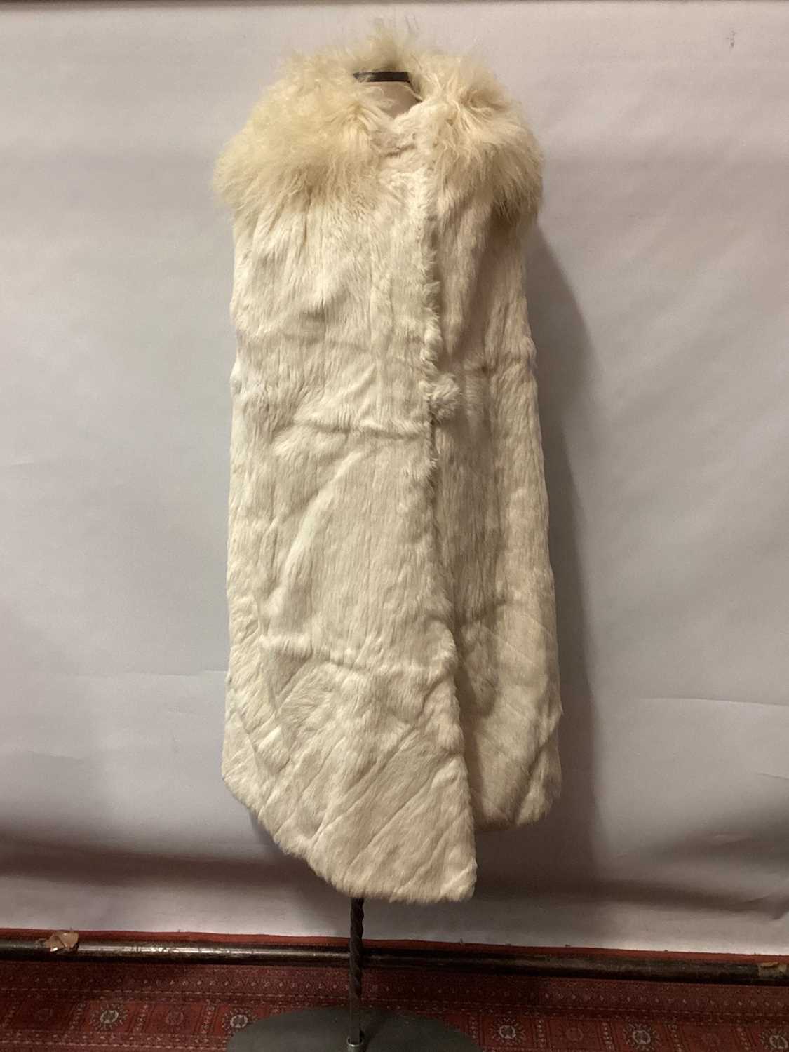 1930s white fur possibly ermine, evening cloak lined in cream silk and round fur covered button fast