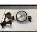 Group of automobilia to include a vintage car headlight, speedometer and car horn