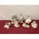 Six Nao porcelain figures and dogs, together with a Lladro swan with cygnets (7)