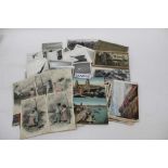 Old photos of Farnborough Air Show 1952, a group of postcards and a group of stamps.