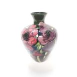 Moorcroft pottery vase decorated in the Anemone Tribute pattern by Emma Bossons, painted by Joanne M
