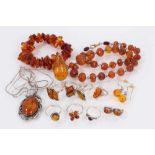 Group of silver mounted amber jewellery
