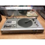 Panasonic combined turntable, cassette player and FM tuner.