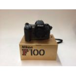 Nikon F100 digital SLR camera body in original box