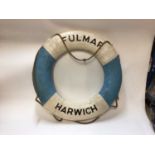 Vintage life ring with painted naming 'Fulmar, Harwich'