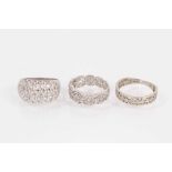 Three 9ct white gold rings all with cut out designs