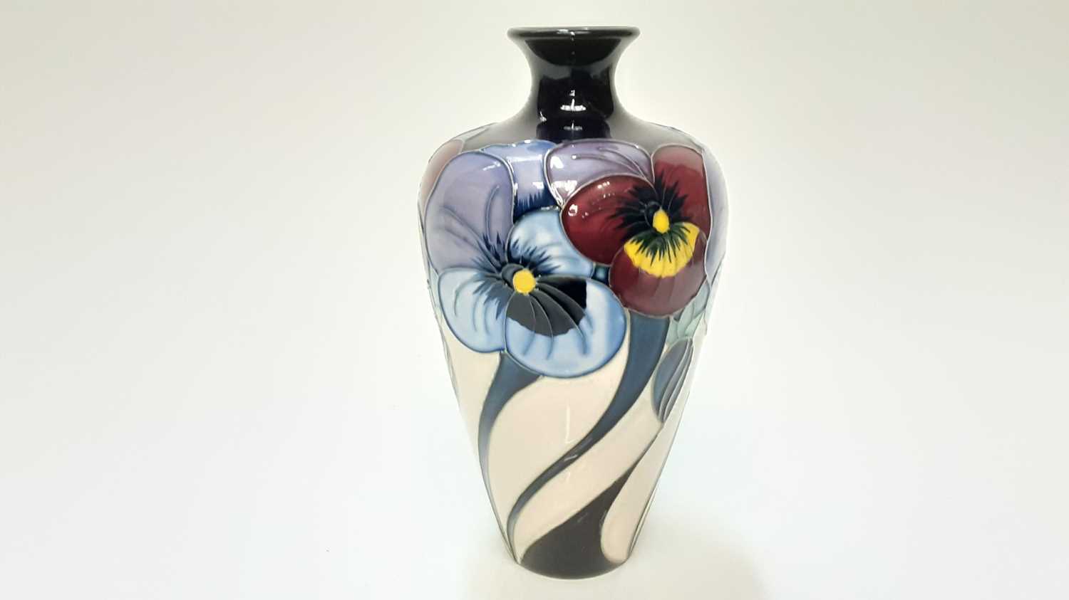 Moorcroft pottery limited edition vase decorated in the Pansy Pastime (locked room) pattern by Rache