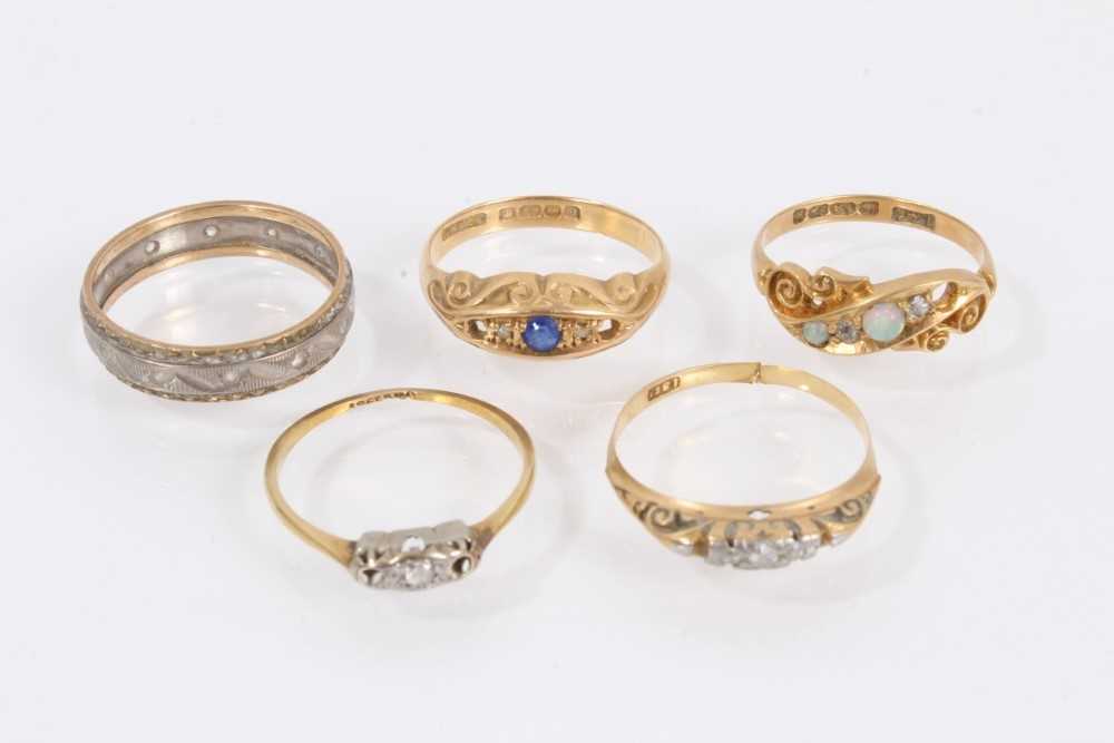 Five antique and later 18ct gold rings, all with stones missing