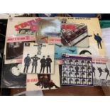 Group of Beatles singles, one Beatles LP and Status Quo singles.