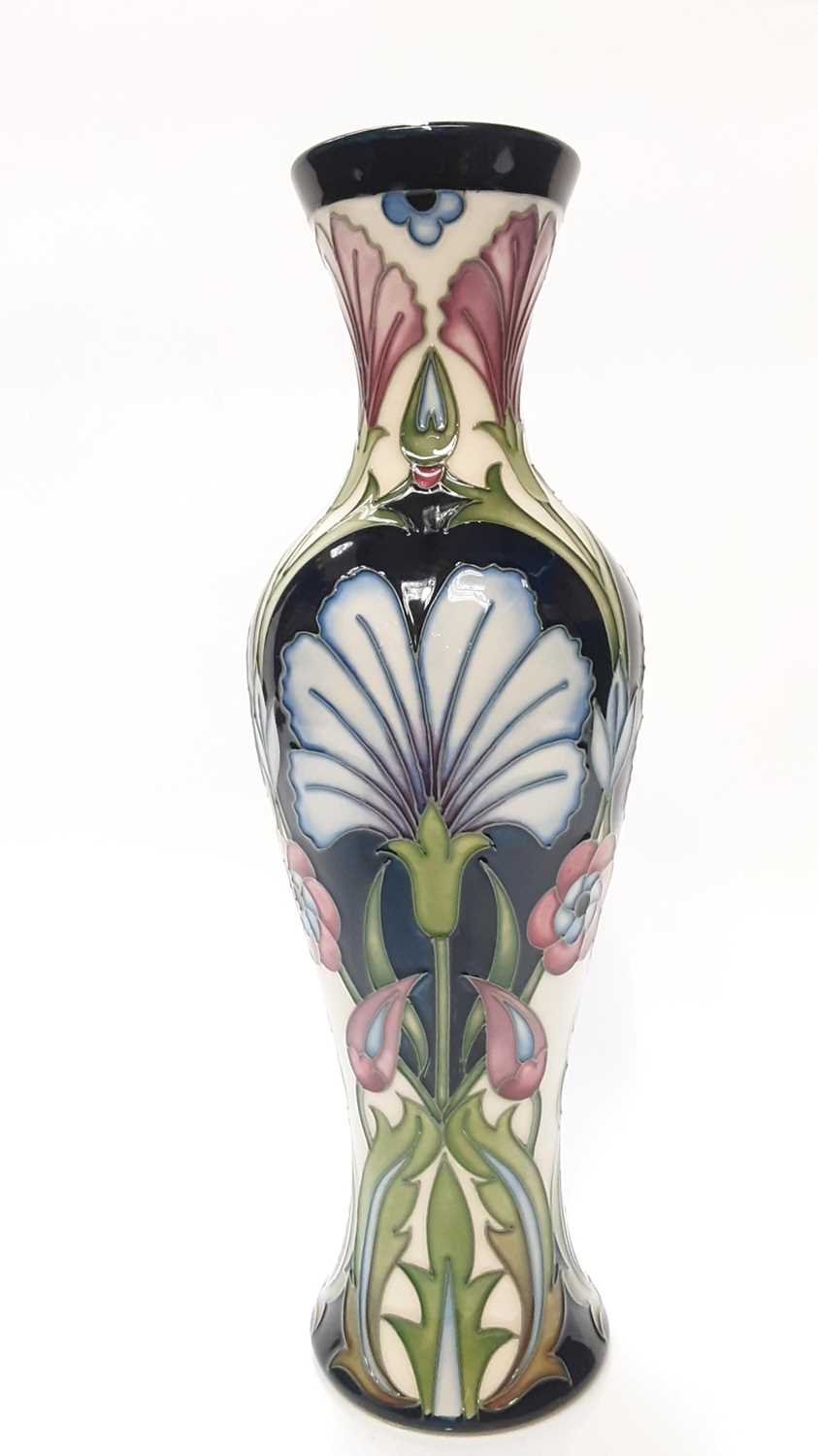 Moorcroft pottery Trial vase decorated with blue and pink flowers, dated 17-8-09, 31cm high, boxed