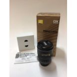 A Nikon Nikkor 17-55mm f/2.8G IF ED AF-S lens in original box with instructions and soft case